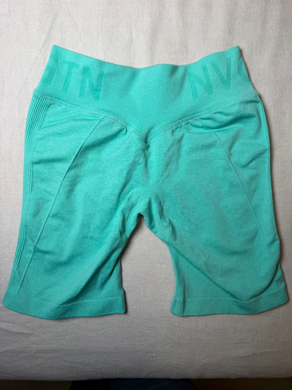 NVGTN High-Waist Performance Shorts in Aqua